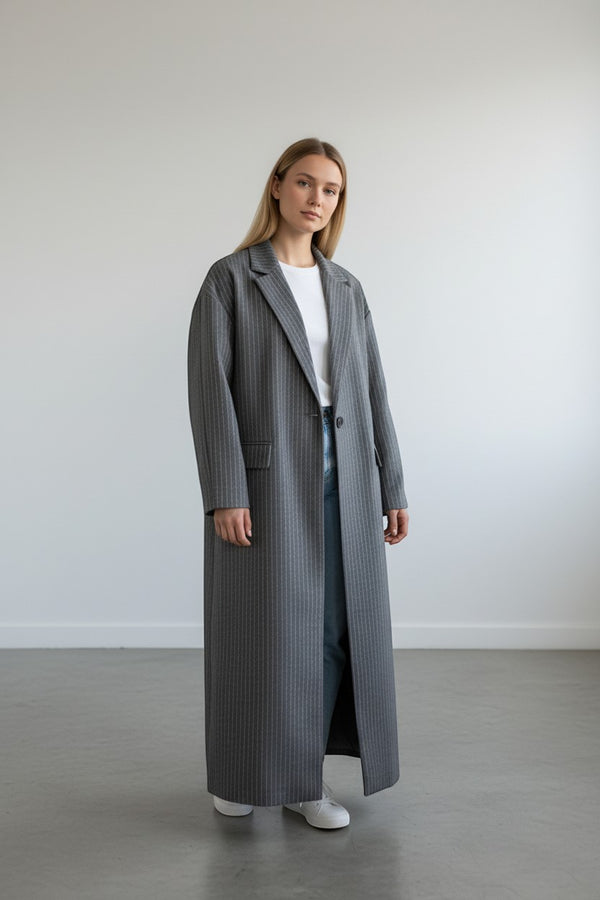 A&M FANCY STORE grey and white pinstripe longline blazer with lapel collar and flowing silhouette.